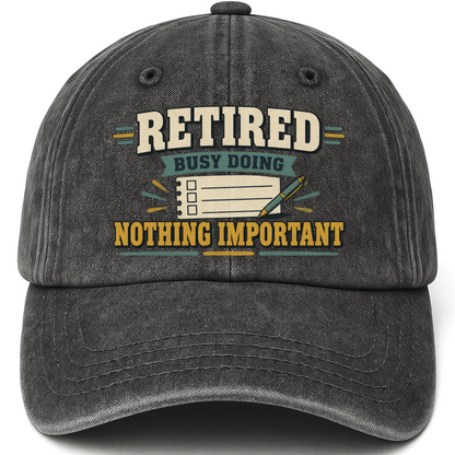 Black vintage washed cap with Retired. Busy Doing Nothing Important printed front design