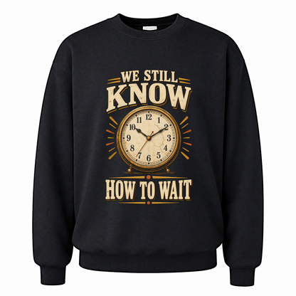 Black vintage sweatshirt with We Still Know How To Wait printed front design