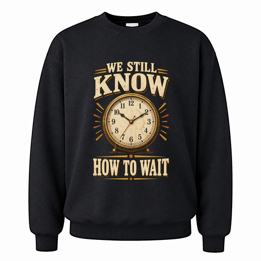 Black vintage sweatshirt with We Still Know How To Wait printed front design