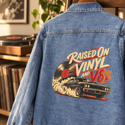 Close-up of Raised on Vinyl and V8s vinyl record and muscle car print on denim jacket back