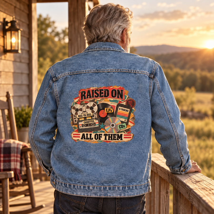 Senior man in blue vintage denim jacket with Raised On All Of Them printed on back.