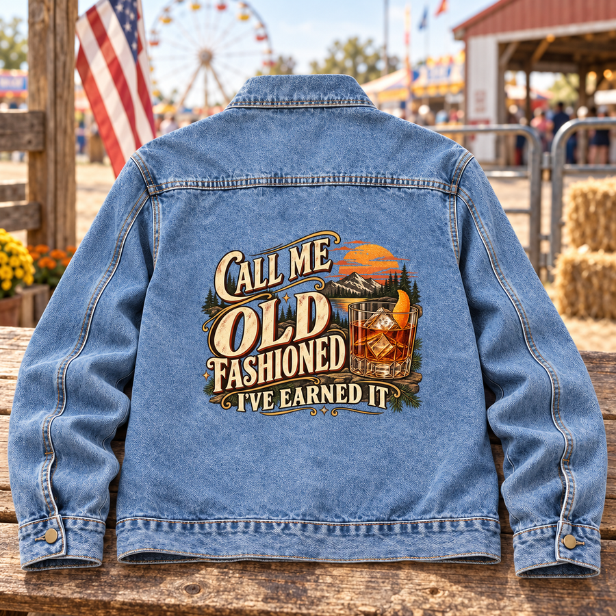 Blue vintage denim jacket, back view, with printed Old Fashioned slogan and whiskey glass