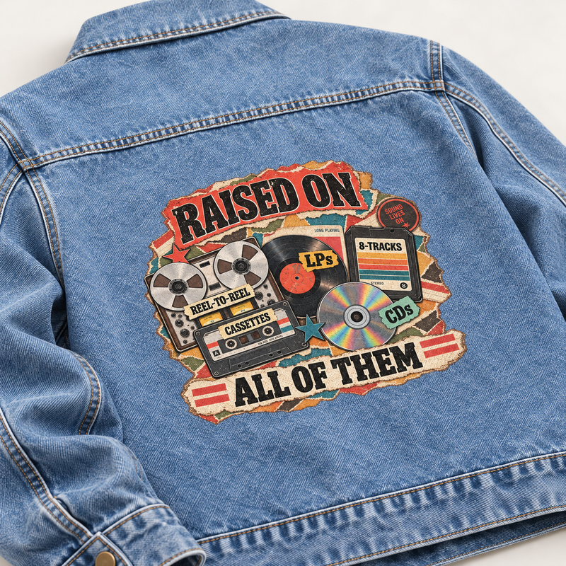 Blue vintage denim jacket back with printed Raised On All Of Them music graphic