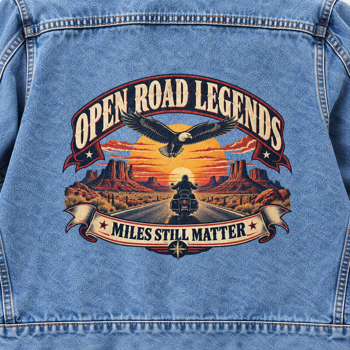 Close-up of Open Road Legends. Miles Still Matter printed design on the back of vintage denim jacket
