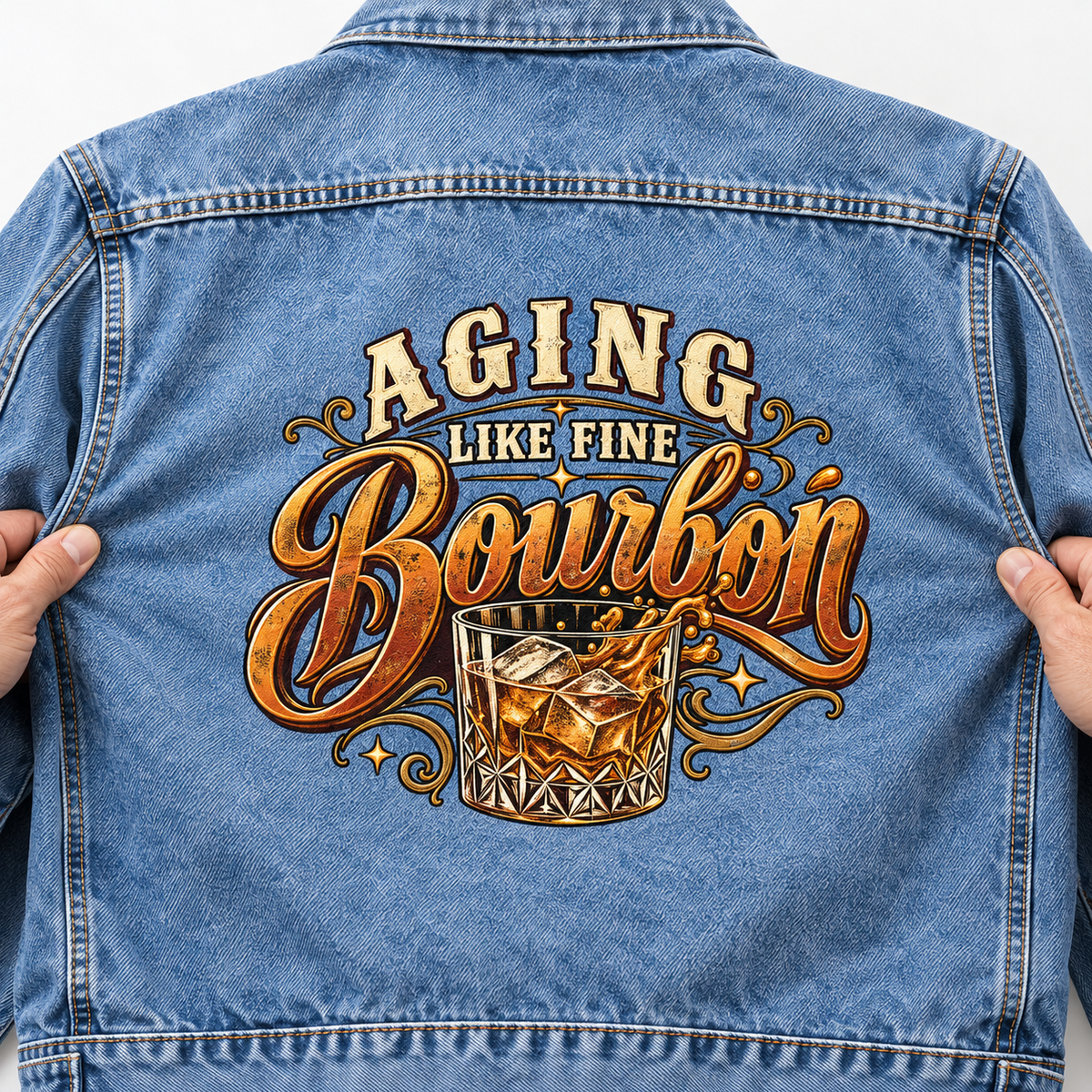 Blue vintage denim jacket, back view, with printed Aging Like Fine Bourbon and whiskey glass