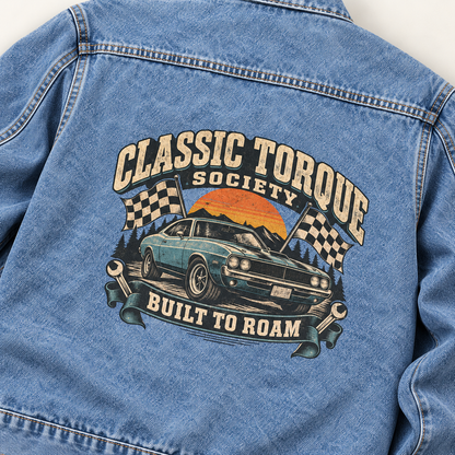 Close-up of Classic Torque Society Built To Roam printed design on the back of vintage denim jacket
