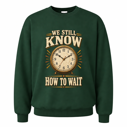 Forest Green vintage sweatshirt with We Still Know How To Wait printed front design