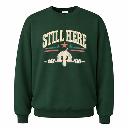 Forest Green vintage sweatshirt with Still Here printed front design