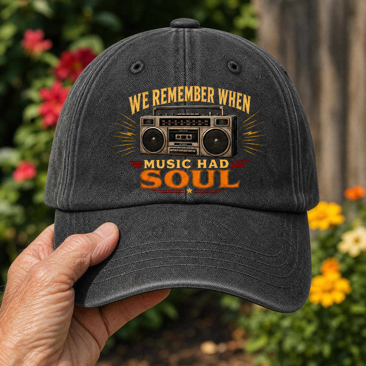 Black vintage washed cap with printed We Remember When Music Had Soul design, handheld front view