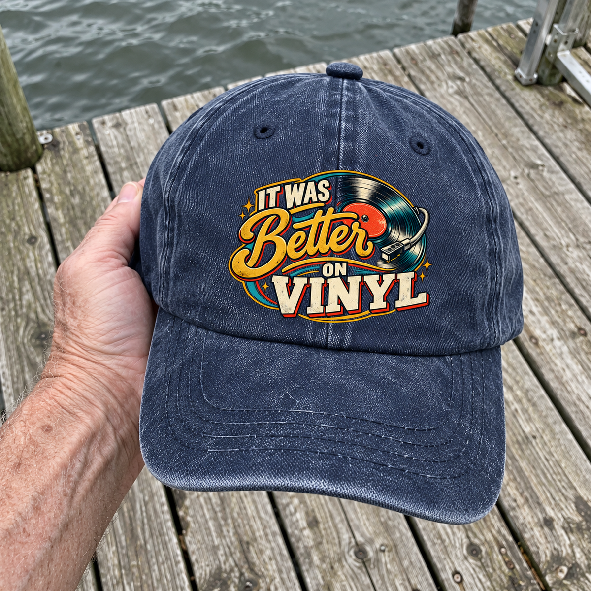 Handheld navy vintage washed cap with printed It Was Better On Vinyl record design