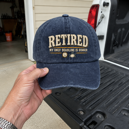 Handheld navy vintage washed cap with printed Retired My Only Deadline Is Dinner slogan