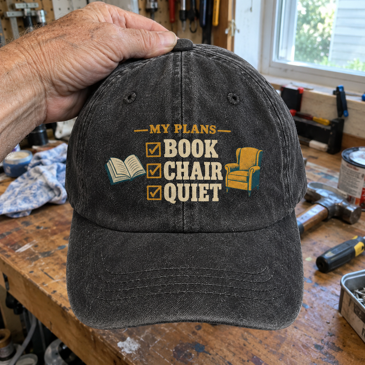Black Vintage Washed Cap With Printed My Plans Book Chair Quiet Design, Handheld Front View