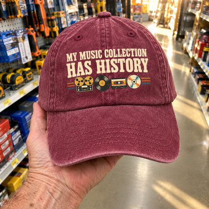 Burgundy vintage washed cap with printed “My Music Collection Has History” slogan and retro records
