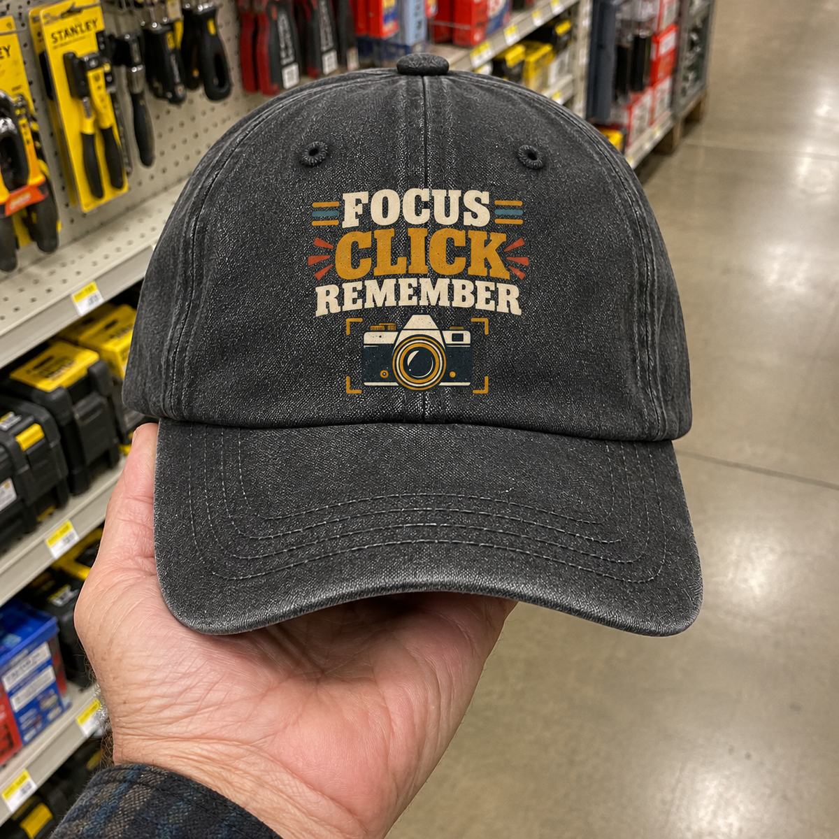Black vintage washed cap with Focus Click Remember printed design, handheld store view