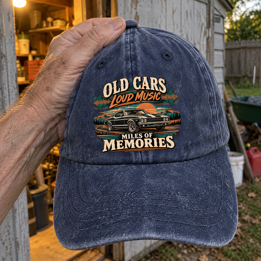 Handheld navy vintage washed cap with printed car and Old Cars Loud Music slogan