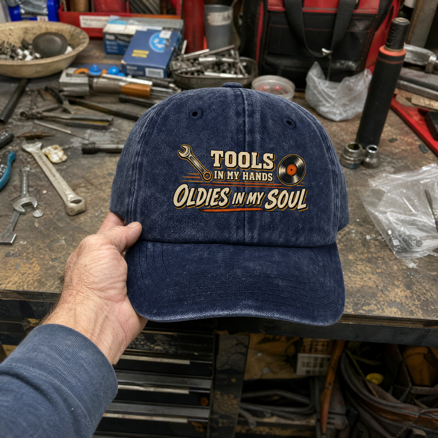 Vintage washed cap with printed “Autumn Sensory Play” slogan, handheld product view