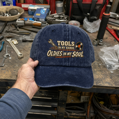 Vintage washed cap with printed “Autumn Sensory Play” slogan, handheld product view