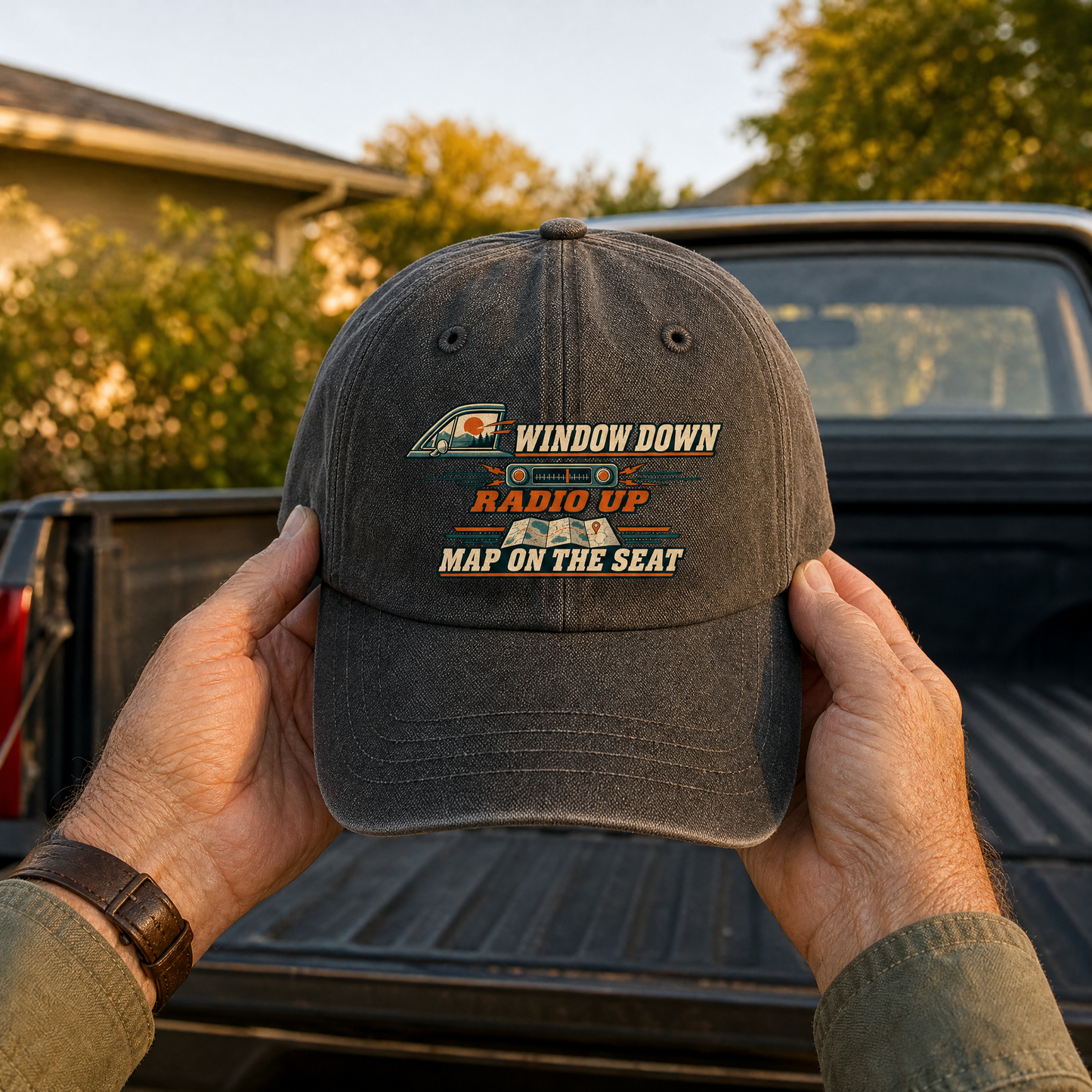 Dark vintage washed cap with printed Window Down Radio Up Map On The Seat, handheld view