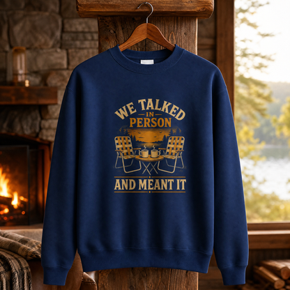 Navy vintage sweatshirt with printed “We Talked in Person” design, hanging by a wooden hanger