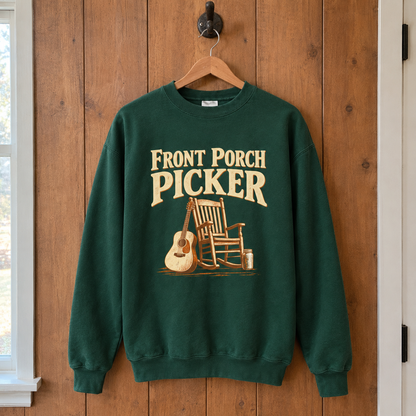 Green vintage sweatshirt hanging with printed Front Porch Picker slogan on front