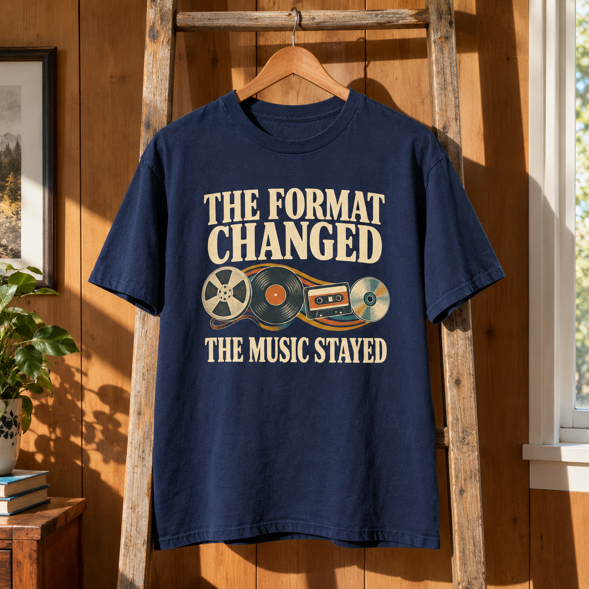 Navy vintage t-shirt hanging with printed The Format Changed The Music Stayed design