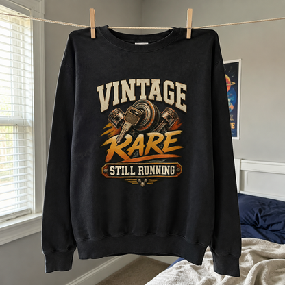 Black vintage sweatshirt hanging with Vintage Rare Still Running printed graphic design