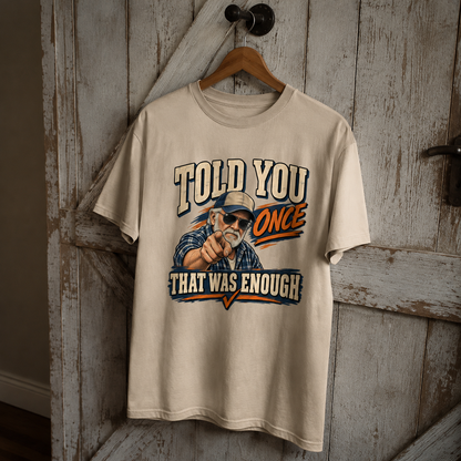 Cream vintage t-shirt hanging with printed Told You Once That Was Enough graphic design