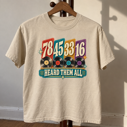 Cream vintage t-shirt hanging, printed with 78 45 33 16, records, and Heard Them All