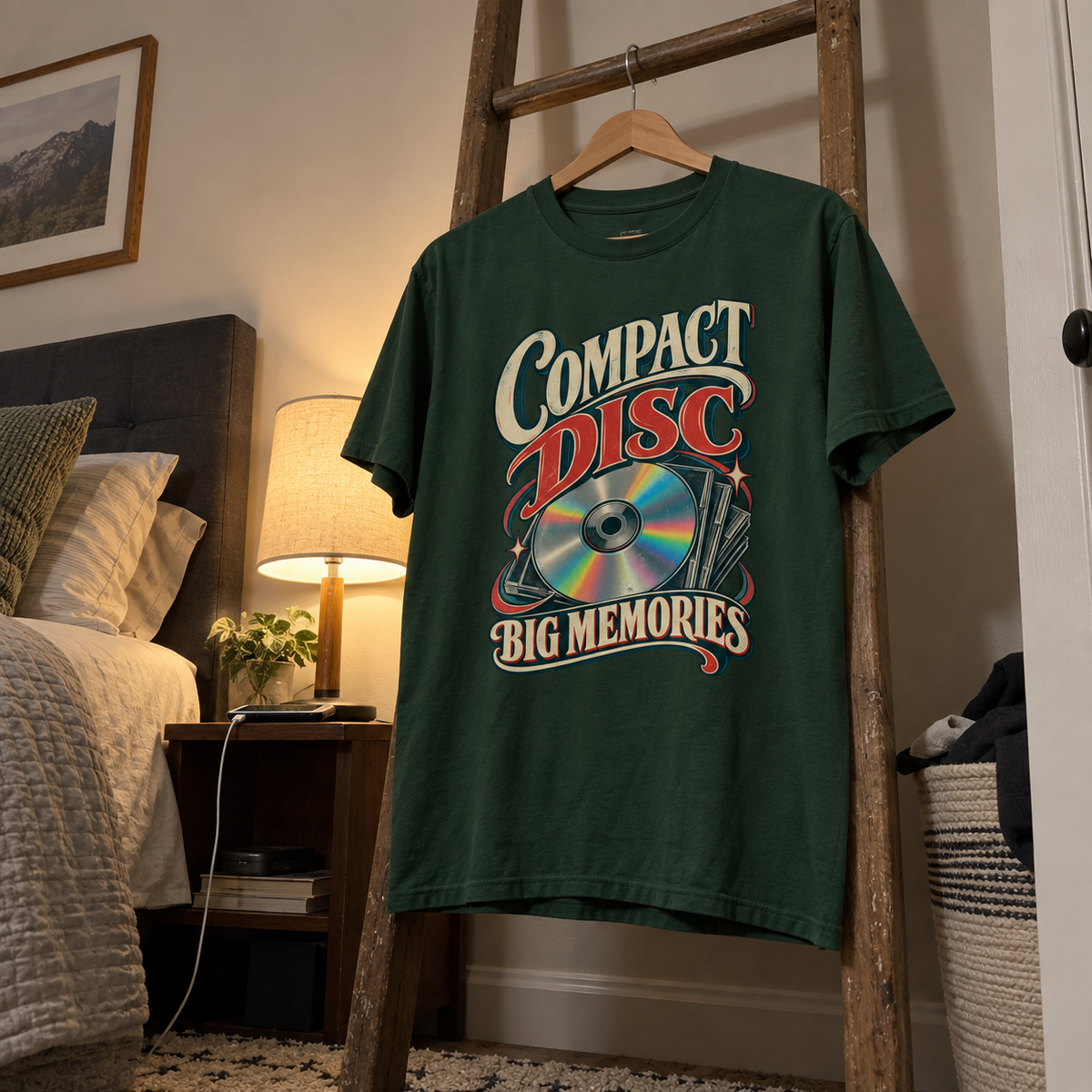 Dark green vintage t-shirt hanging in bedroom with printed Compact Disc Big Memories design
