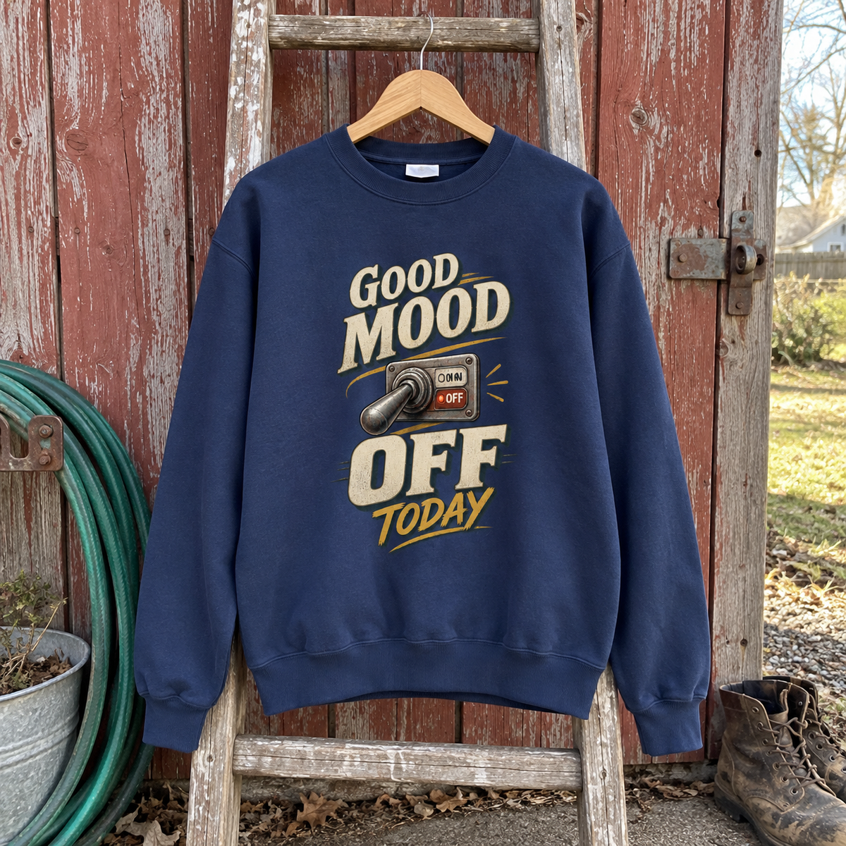 Navy vintage sweatshirt hanging on wooden ladder with printed Good Mood Off Today switch design