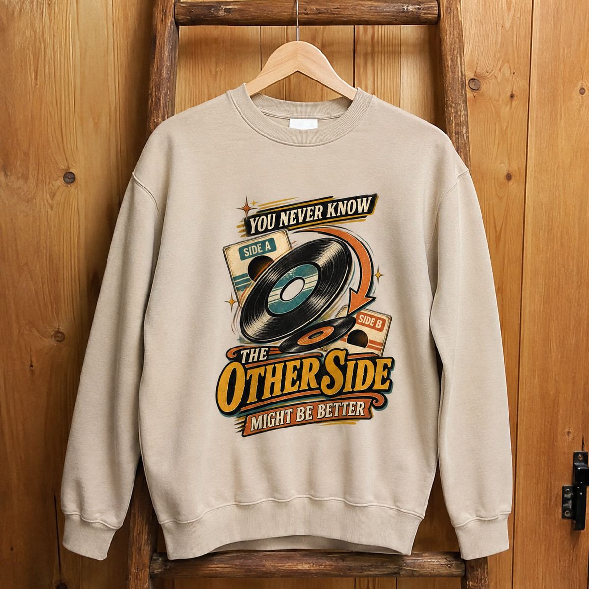 Vintage sweatshirt hanging with printed You Never Know The Other Side Might Be Better design