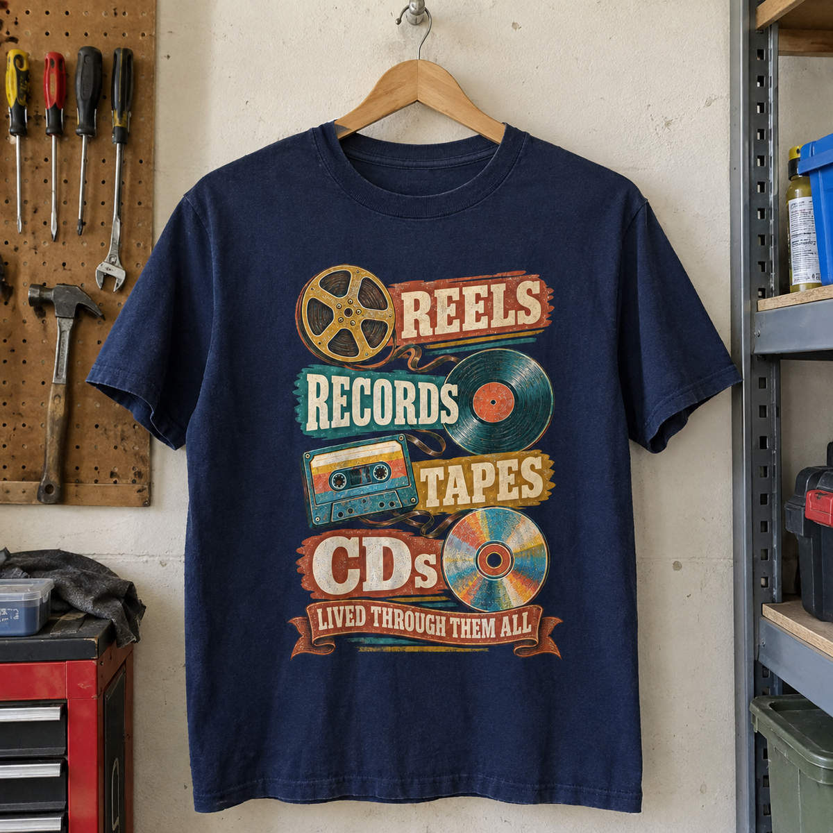 Navy vintage t-shirt hanging with printed Reels Records Tapes CDs retro music design