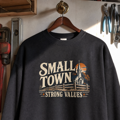 Black vintage sweatshirt hanging with printed Small Town Strong Values design