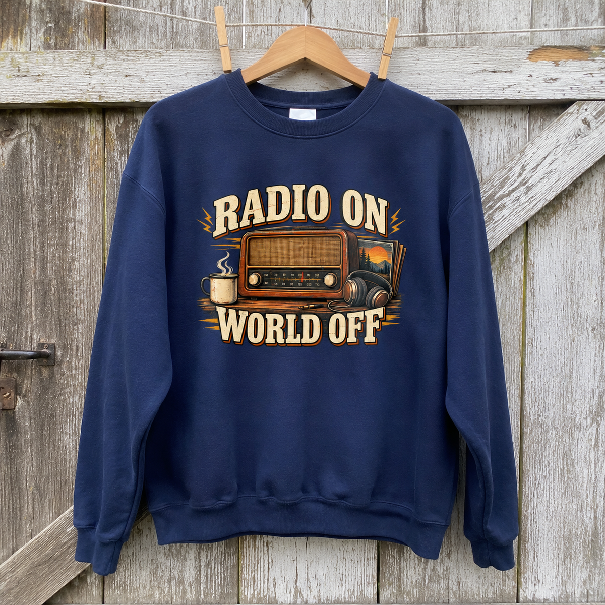 Navy vintage sweatshirt hanging with printed Radio On World Off retro radio design