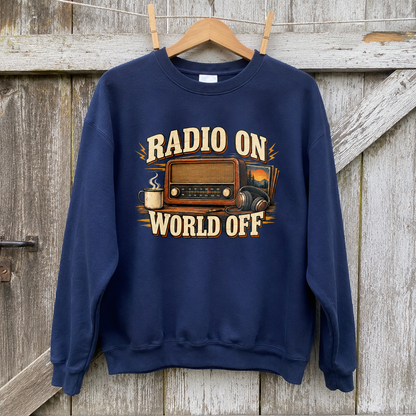 Navy vintage sweatshirt hanging with printed Radio On World Off retro radio design