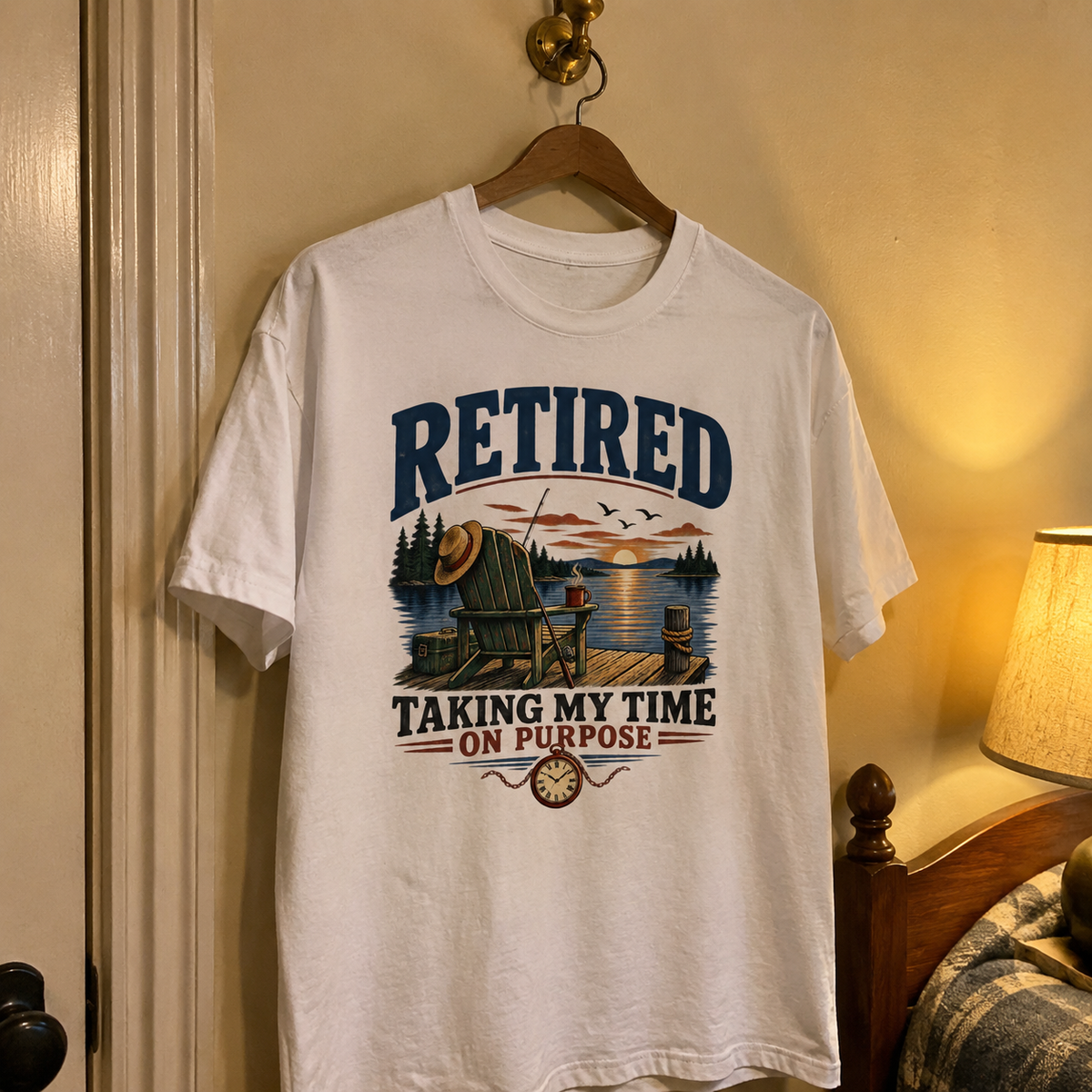 White vintage t-shirt hanging with printed Retired Taking My Time On Purpose lake design