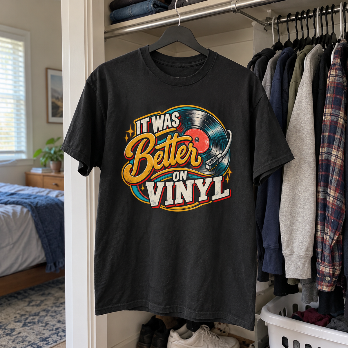 Black vintage t-shirt hanging in closet with printed It Was Better On Vinyl design.