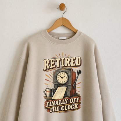 Beige vintage sweatshirt hanging with printed Retired Finally Off The Clock design