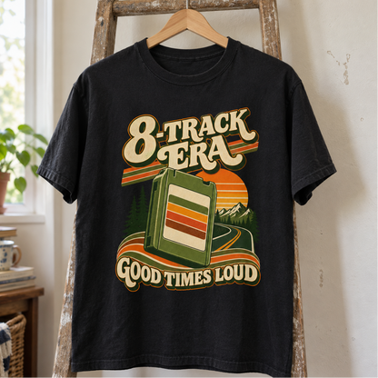 Black vintage t-shirt hanging with printed 8-Track Era Good Times Loud cassette design
