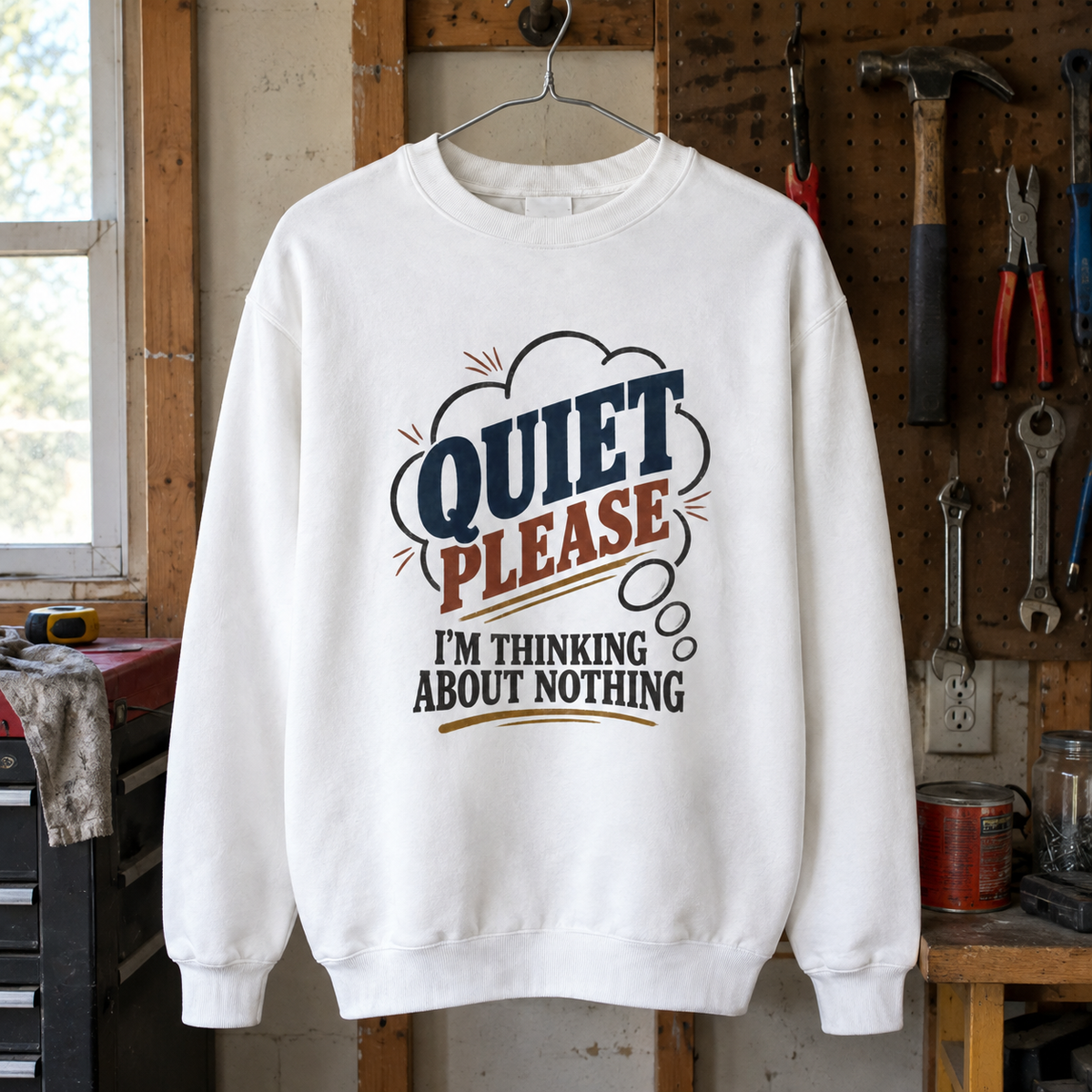 White vintage sweatshirt hanging with printed Quiet Please. I'm Thinking About Nothing design