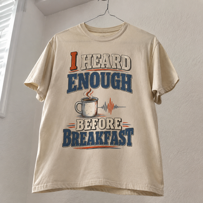 Cream vintage t-shirt hanging with printed I Heard Enough Before Breakfast slogan