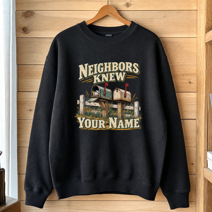 Black vintage sweatshirt hanging with printed “Neighbors Knew Your Name” mailbox design