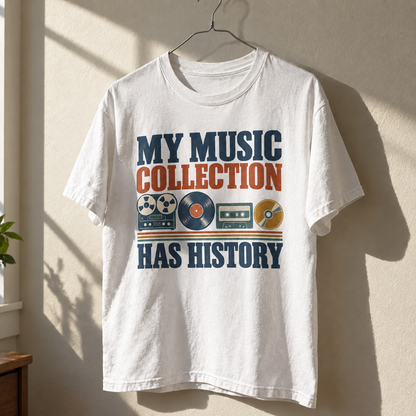 Vintage t-shirt hanging with printed My Music Collection Has History slogan and retro music designs