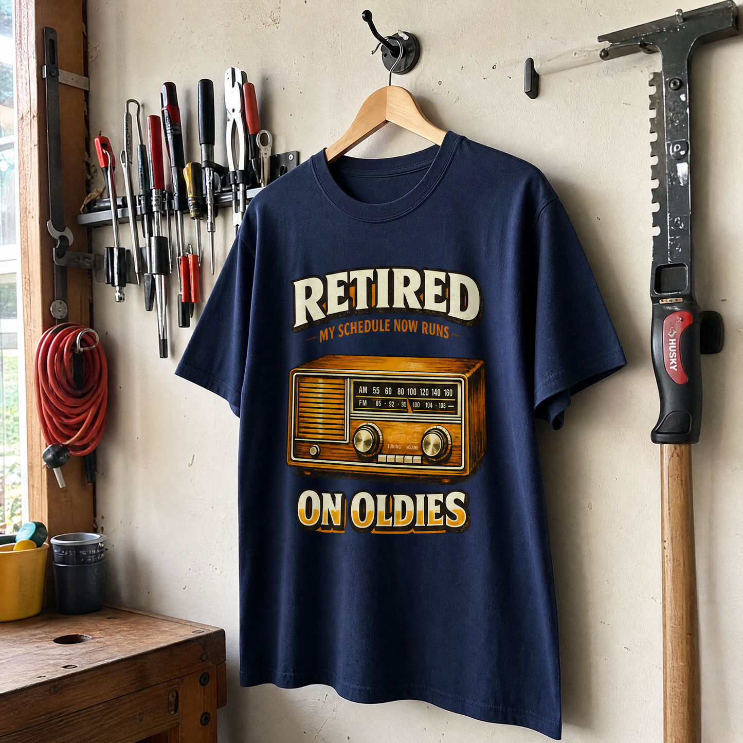 Vintage t-shirt hanging display with printed 39 schedule runs on oldies ideogram 4x design