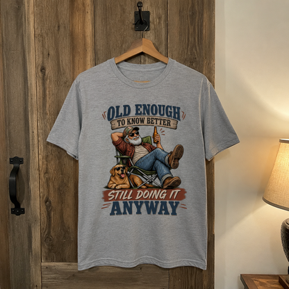 Gray vintage t-shirt hanging with printed Old Enough To Know Better slogan design