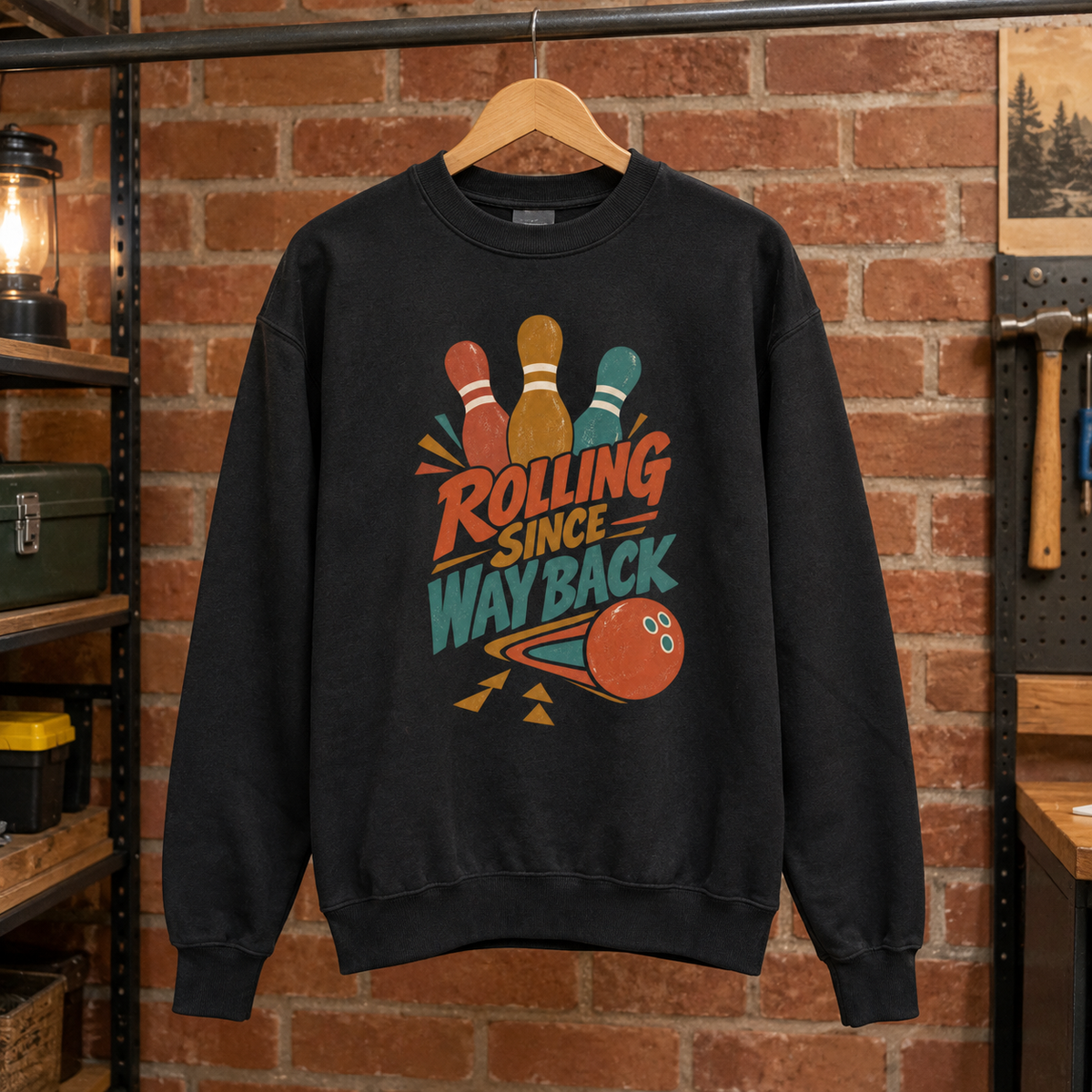 Black vintage sweatshirt hanging with printed Bowling Since Way Back bowling design