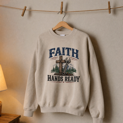 Cream vintage sweatshirt hanging with printed Faith Hands Ready design and cross graphic