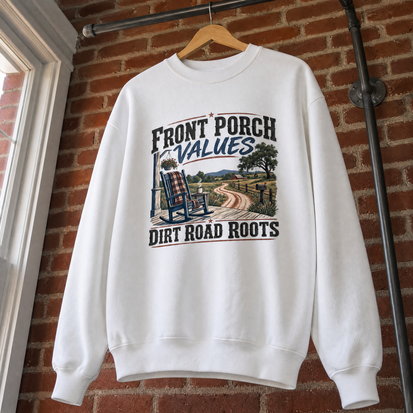 White vintage sweatshirt hanging with printed Front Porch Values Dirt Road Roots design