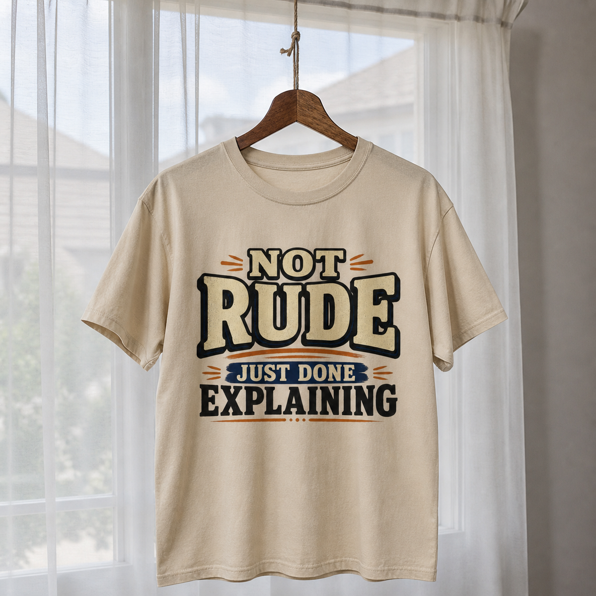 Cream vintage t-shirt hanging with printed Not Rude Just Done Explaining slogan
