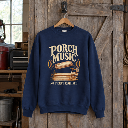 Navy vintage sweatshirt with printed Porch Music No Ticket Required design hanging on wooden door